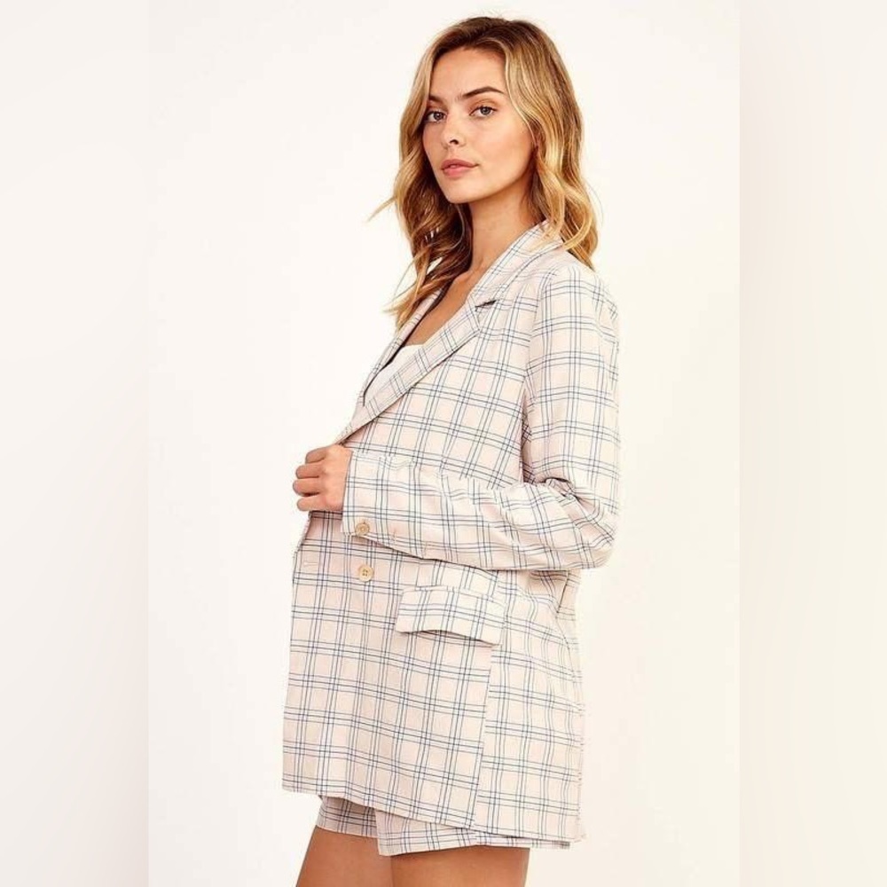 Brand new striped blazer, size medium.